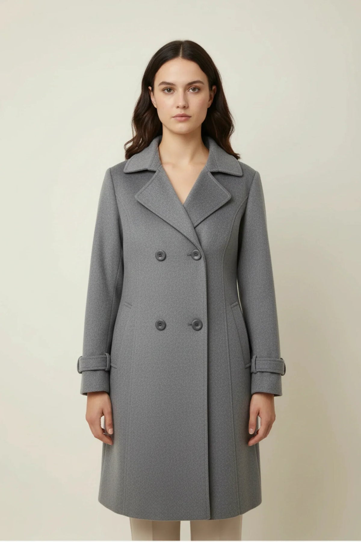 Women's double-breasted mid-length winter coat notched lapel timeless silhouette professional style