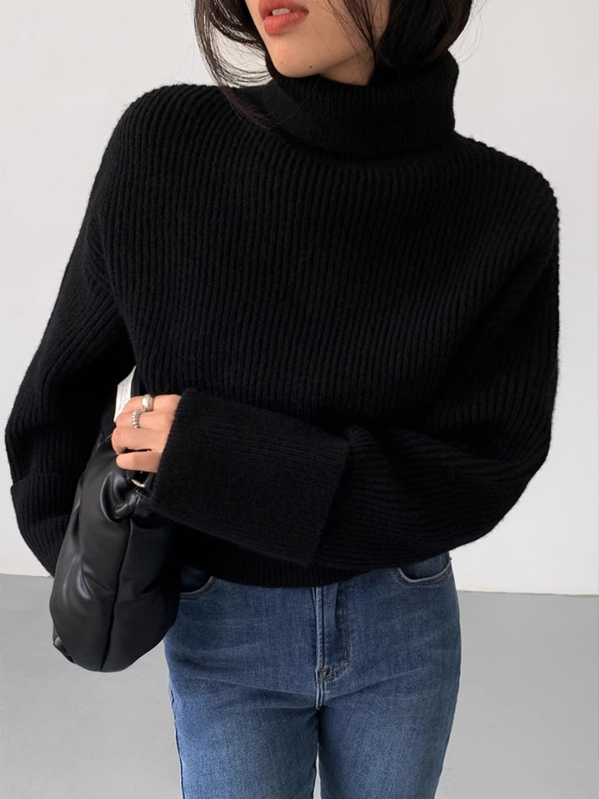Ribbed turtleneck sweater in neutral knit fabric, casual elegant shift fit with high stretch