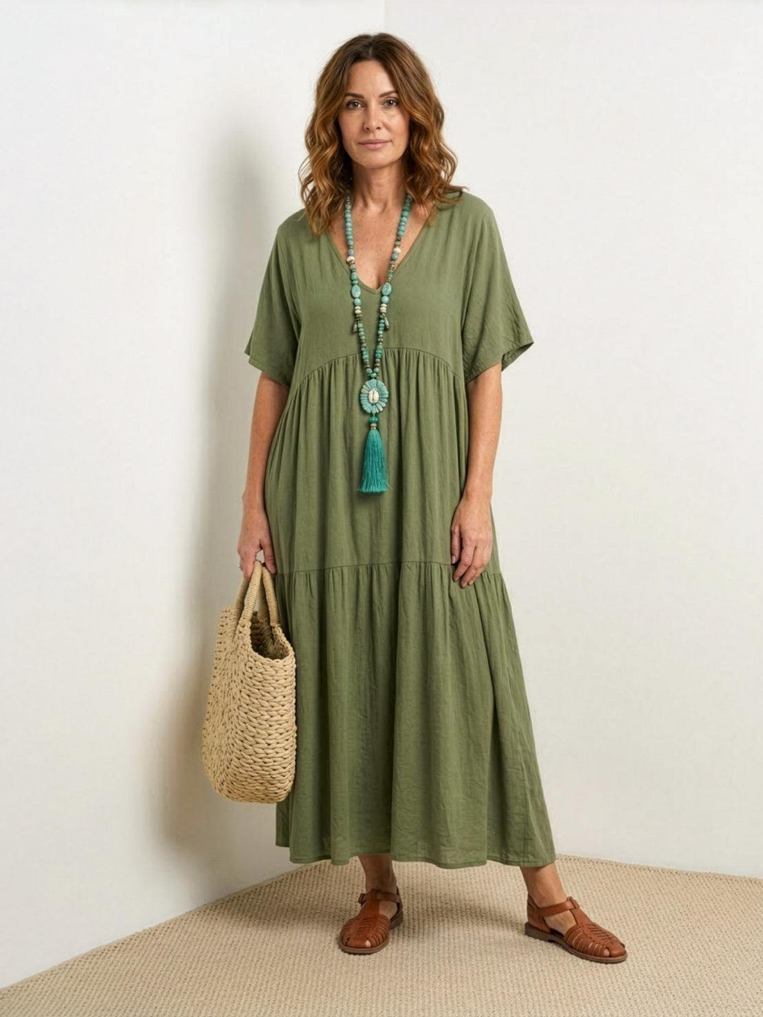 Terracotta women's V-neck tiered maxi swing dress with short sleeves and flowing bohemian silhouette