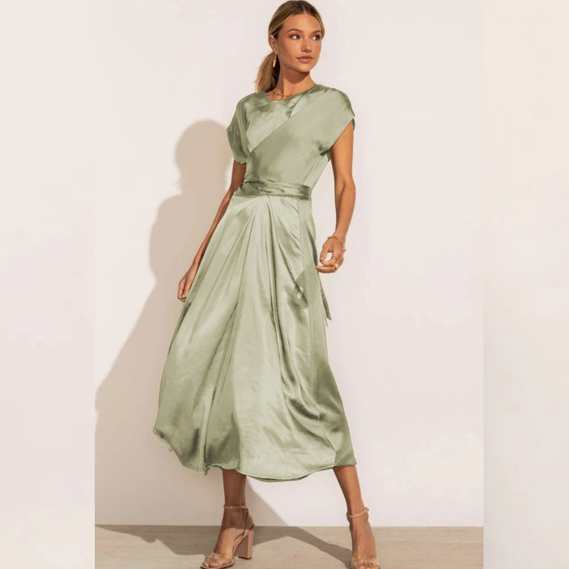 Women's elegant midi dress in A-line wrap silhouette featuring a flattering V-neck Nordic-inspired design