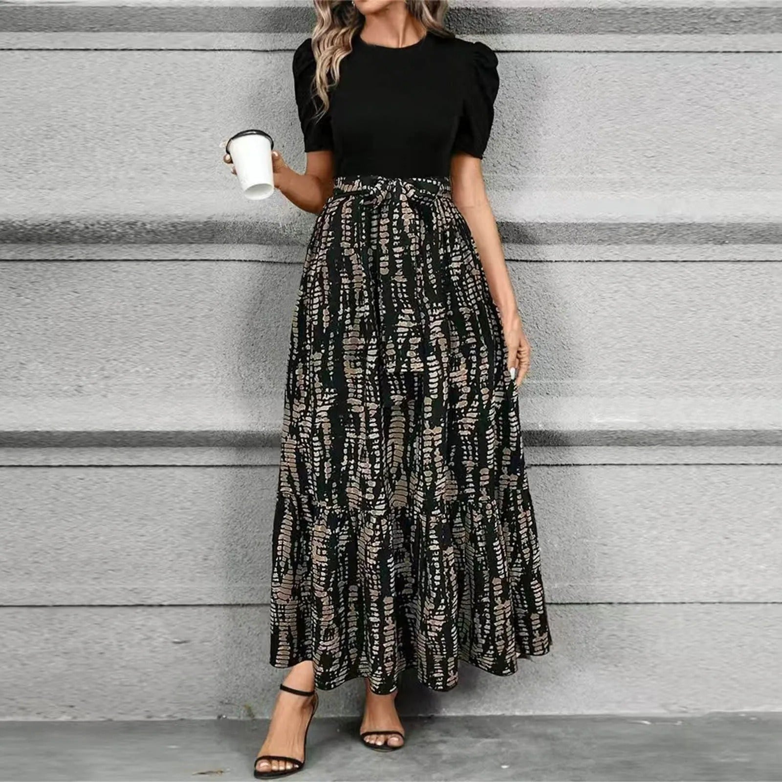Black floral botanical print maxi dress high-waist A-line silhouette elegant garden party style