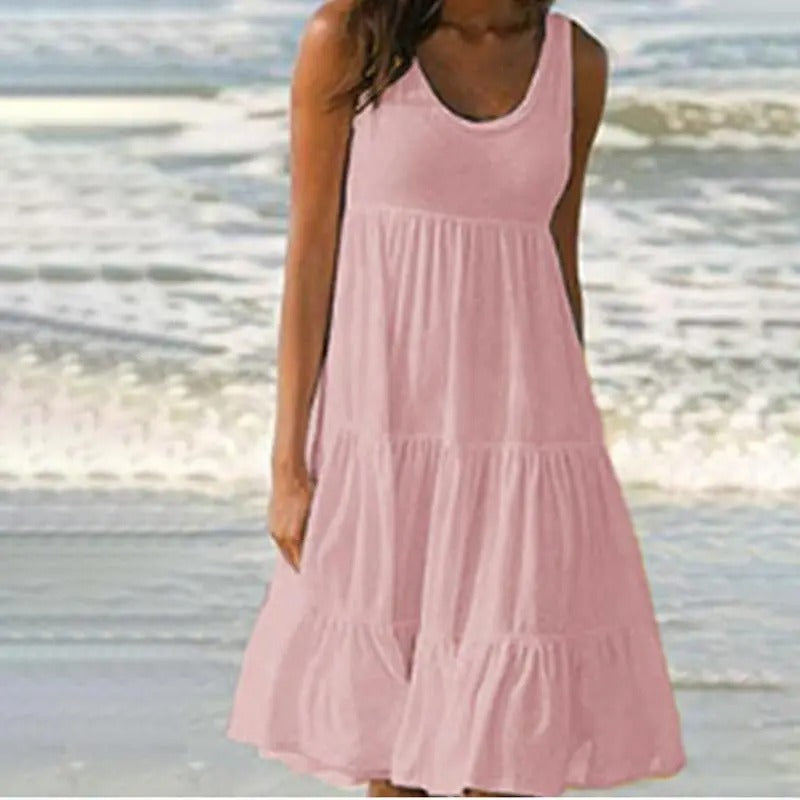 Solid sleeveless bodycon dress with elegant open back and subtle hem split for evenings out