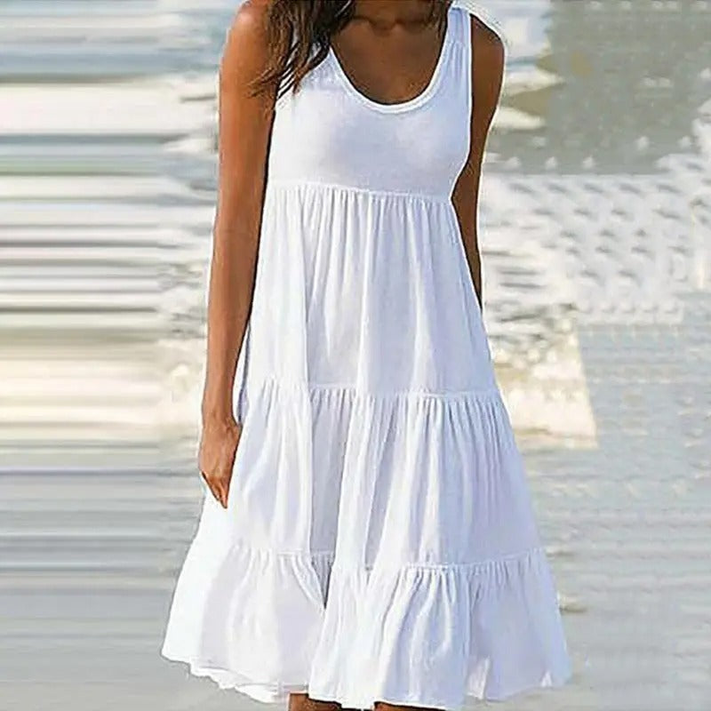 Solid sleeveless bodycon dress with chic open back and subtle hem split for evenings out