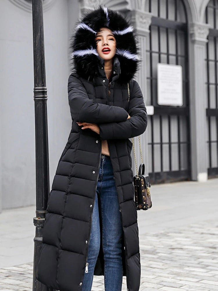 Women's long black belted puffer coat with fur trim hood, quilted longline silhouette