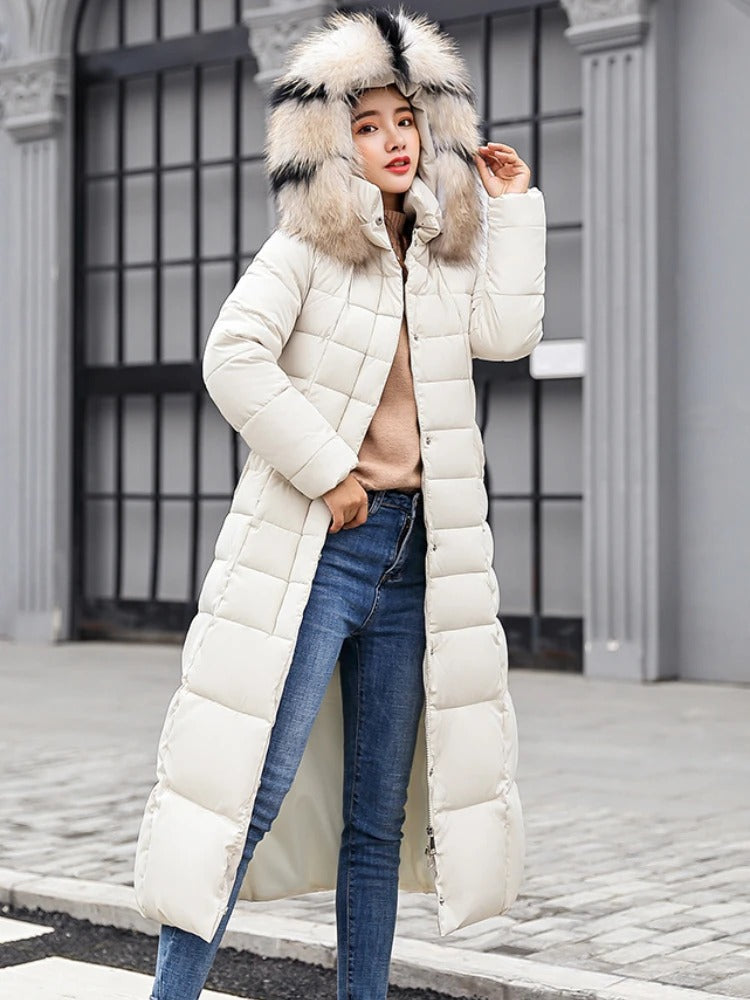 Women's long black belted puffer coat with fur trim hood, quilted longline silhouette