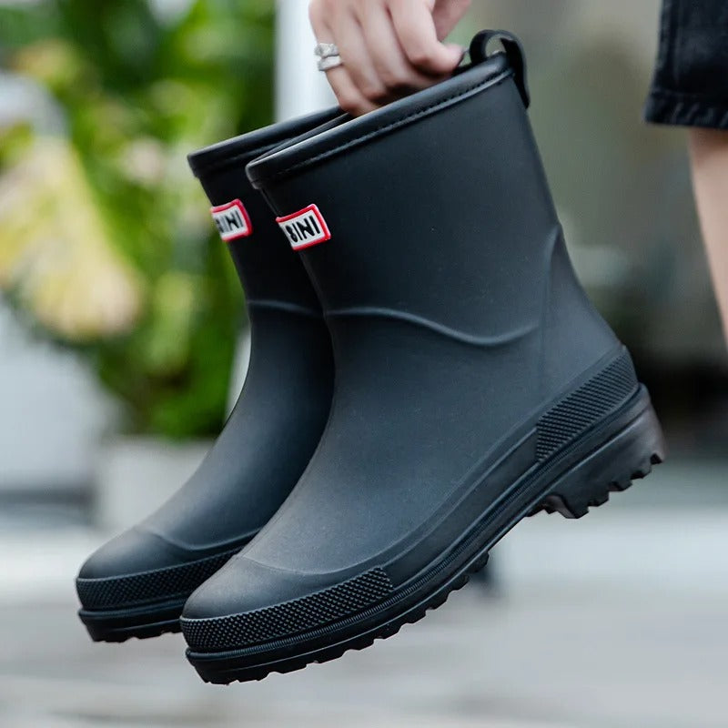Women's waterproof rain boots in sleek modern style with fully waterproof construction for wet weather