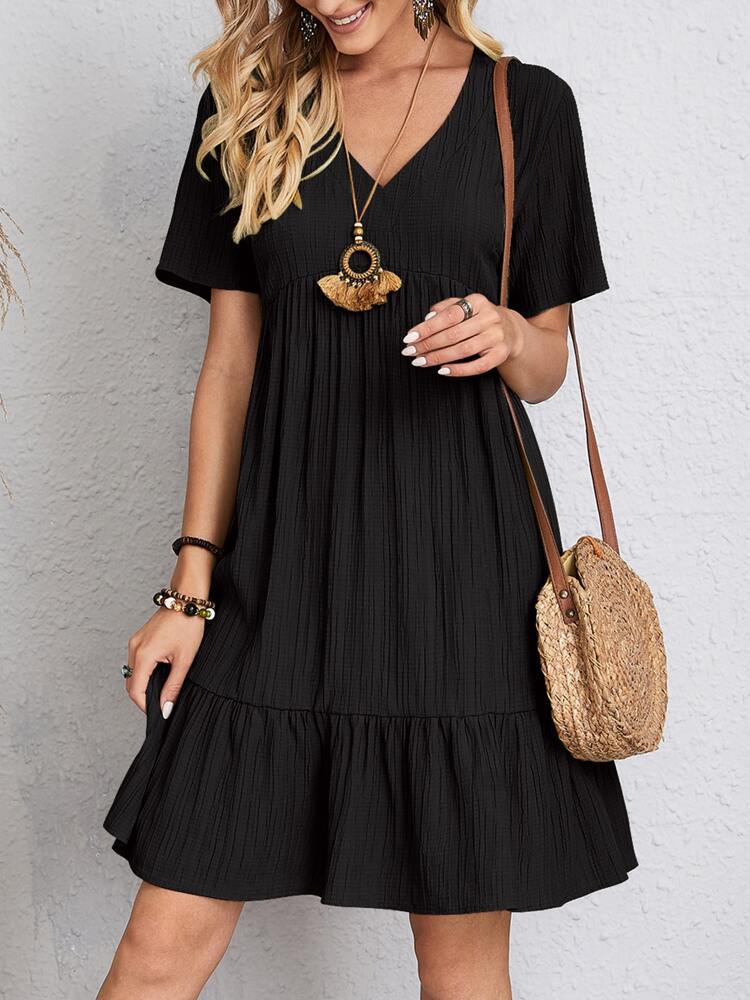 Elegant black belly-coverage dress with flattering cut and refined silhouette for women