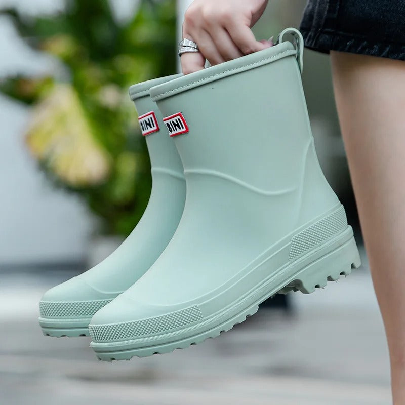 Women's waterproof rain boots in sleek modern style with fully waterproof construction for wet weather