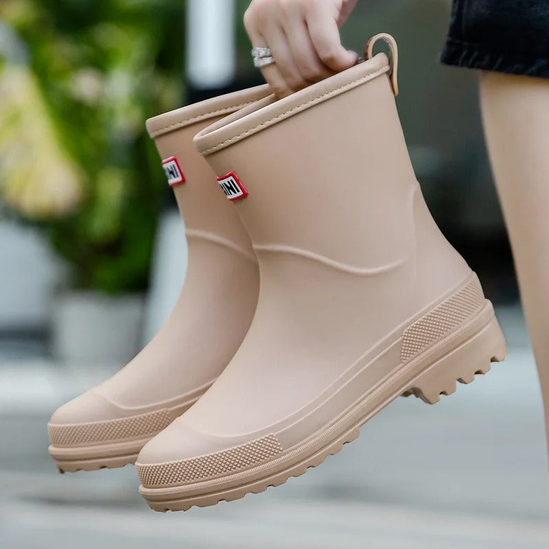 Women's waterproof rain boots in sleek modern design, fully waterproof construction for rainy days