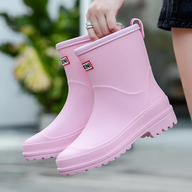 Women's waterproof rain boots in sleek modern style with fully waterproof construction for wet weather