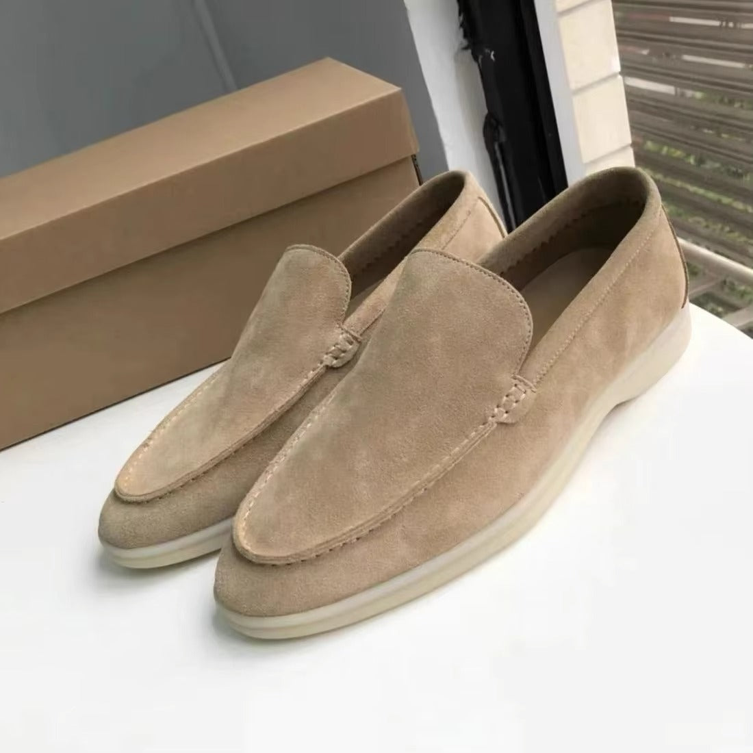 Men's genuine leather white slip-on loafers with cushioned comfort sole, clean polished finish