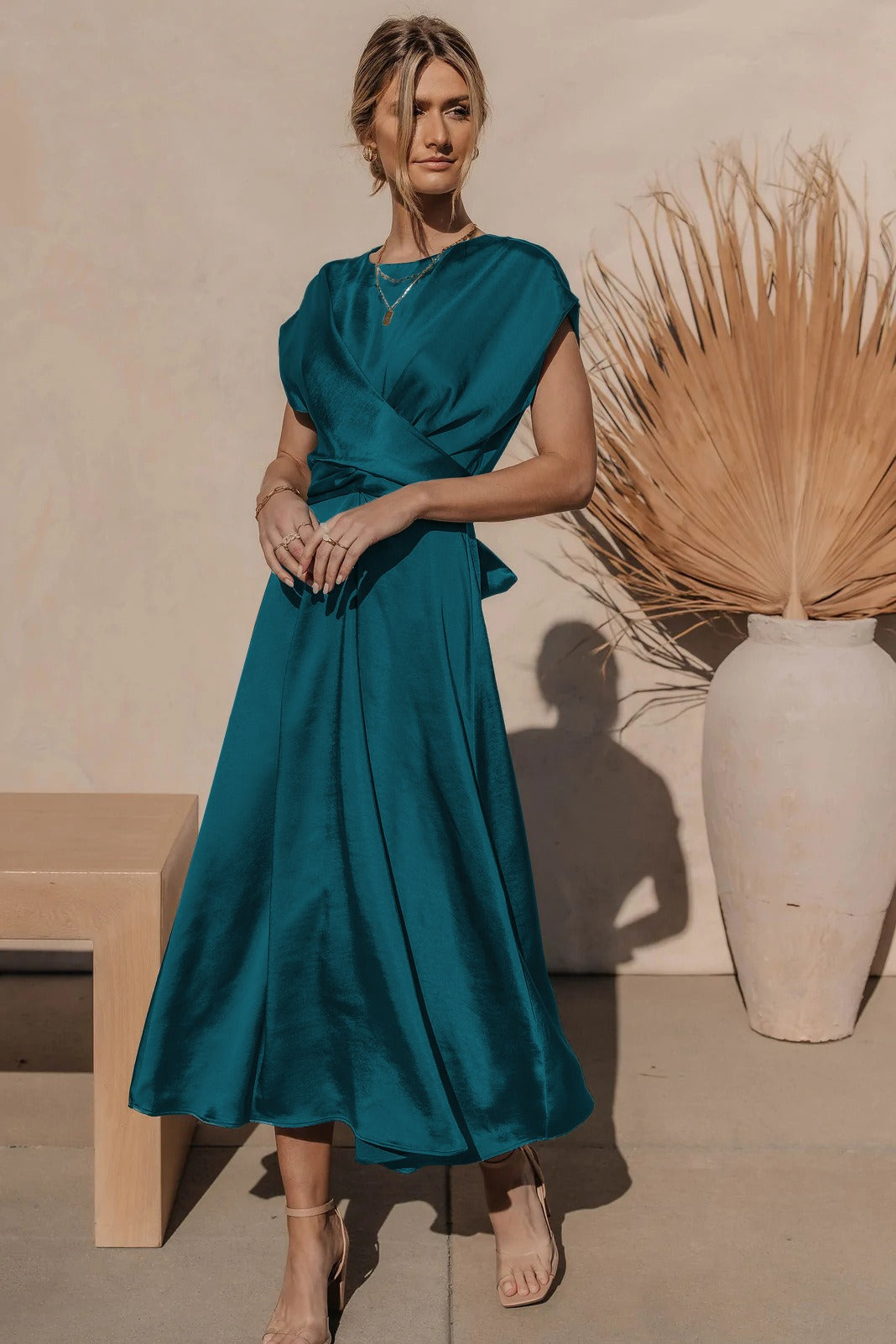 Women's midi dress in elegant A-line wrap style with V-neck neckline and Nordic-inspired silhouette