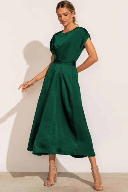 Women's midi dress in elegant A-line wrap design with V-neck, Nordic-inspired style for modern wear