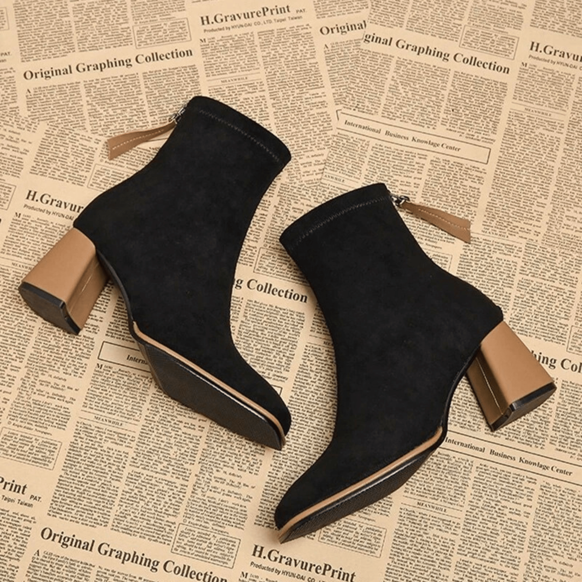 Bellora sleek black boot with streamlined silhouette and leg-lengthening contoured design