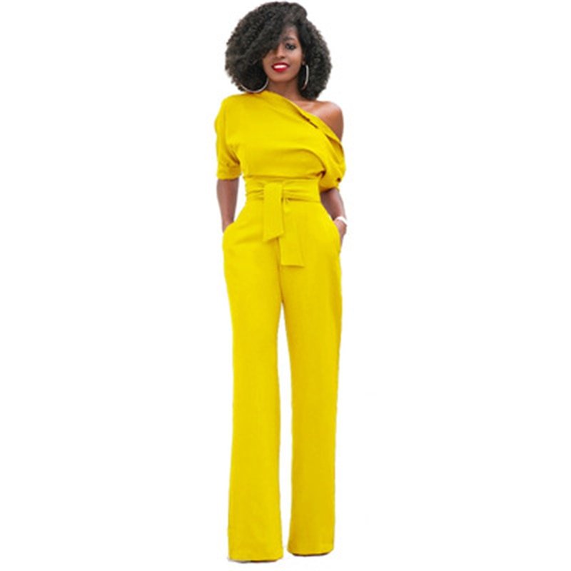 Red wide-leg belted jumpsuit with asymmetric off-shoulder puff sleeve for formal occasions