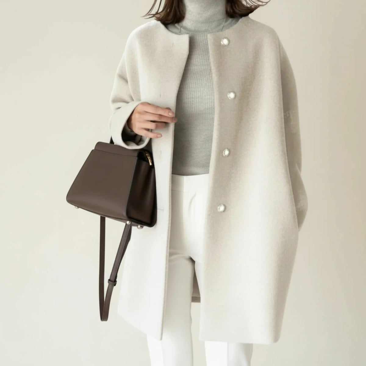 Women's minimalist collarless A-line mid-length winter coat with button-front closure in chic versatile style