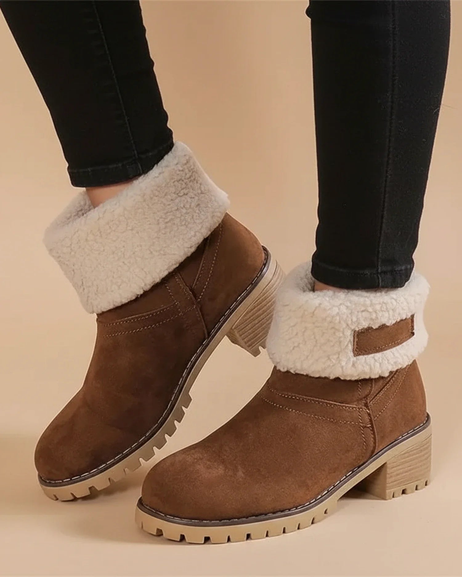 Women's sherpa lined cuffed ankle boots with thick block heel and rugged lug sole