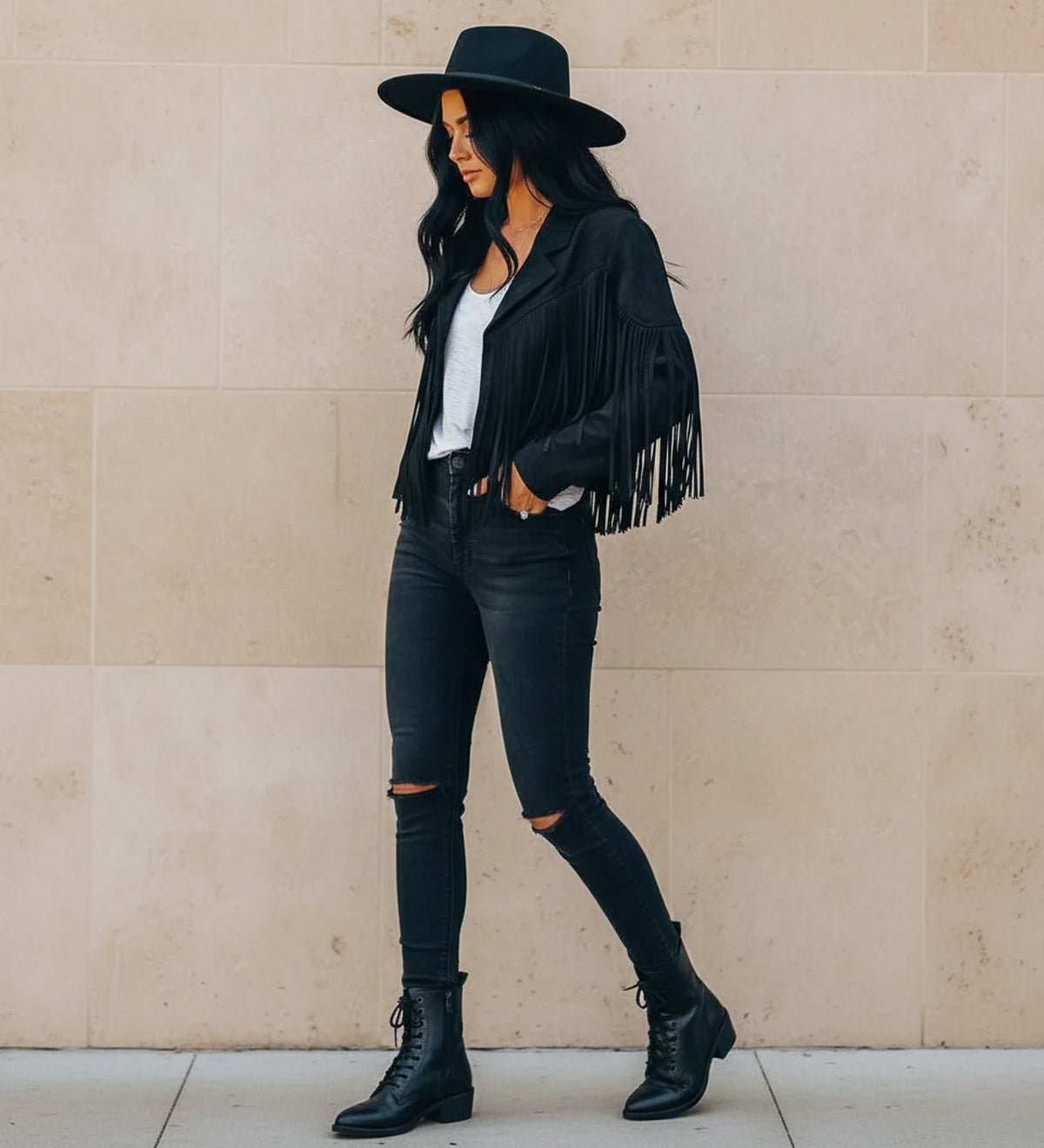 Women's cropped black fringe moto jacket open-front notch lapel Western chic bold statement