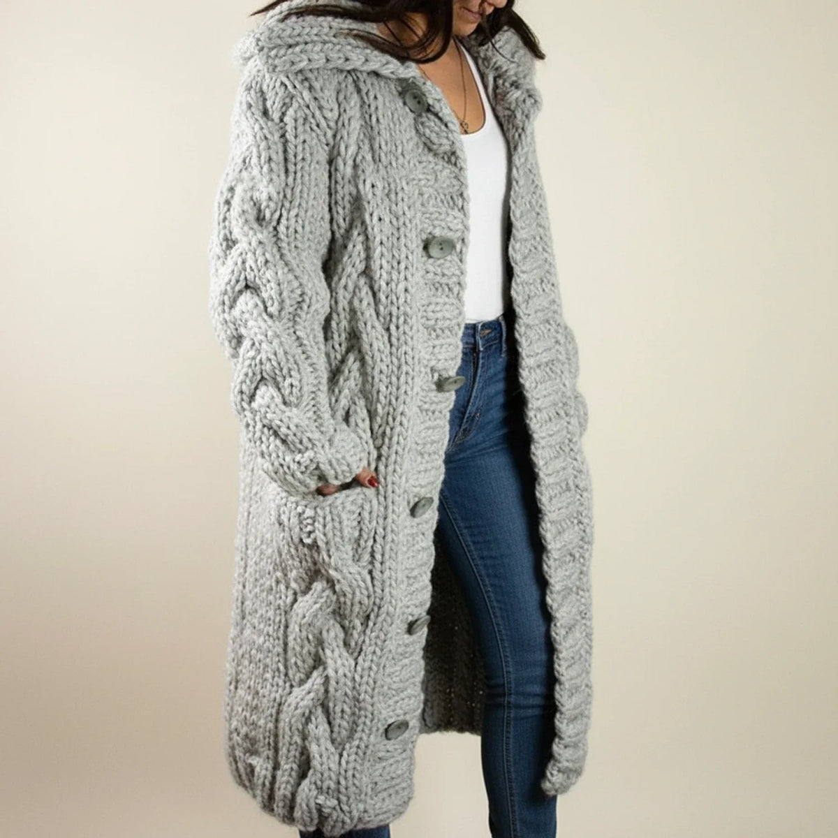 Women's beige cable knit hooded cardigan, long silhouette with button-front closure