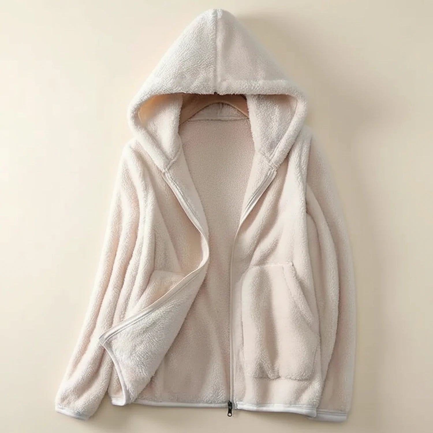 Women's relaxed fit hooded fleece zip-up jacket with patch pockets for everyday layering