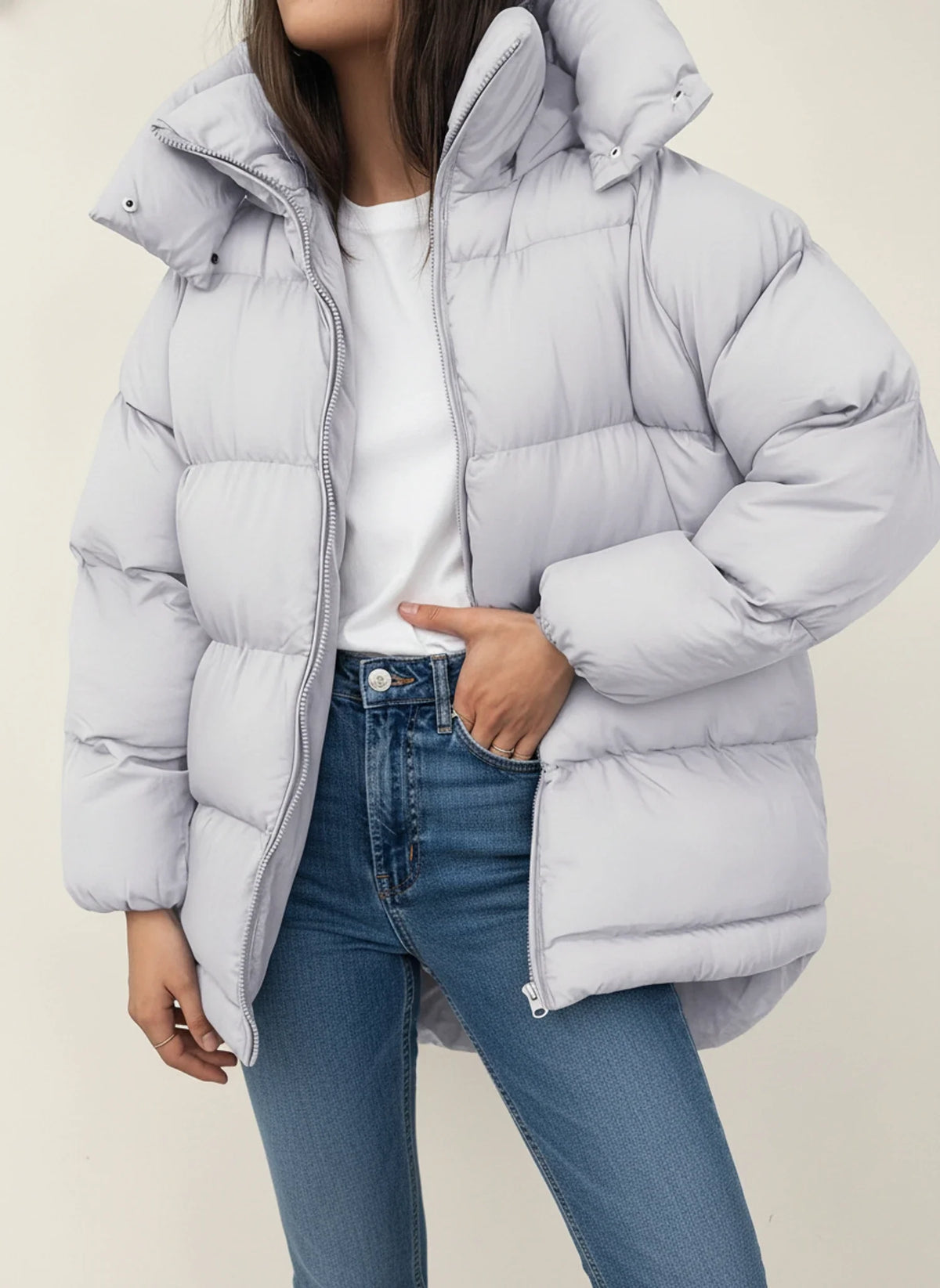 Women's oversized quilted puffer jacket with high collar hood, warm insulated hip-length coat