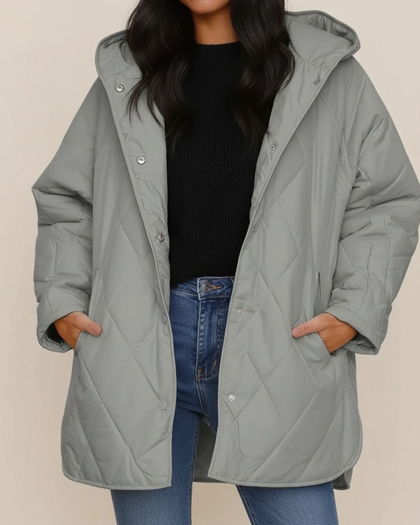 Women's oversized quilted longline hooded winter jacket with patch pockets for everyday warmth
