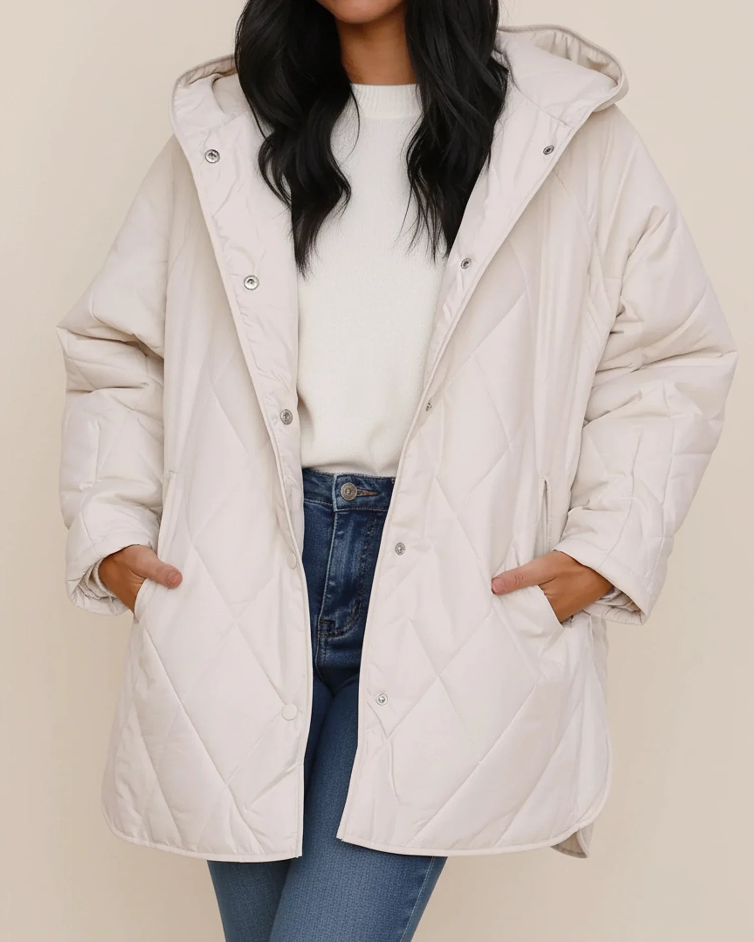 Women's oversized quilted longline hooded winter jacket with patch pockets for everyday warmth