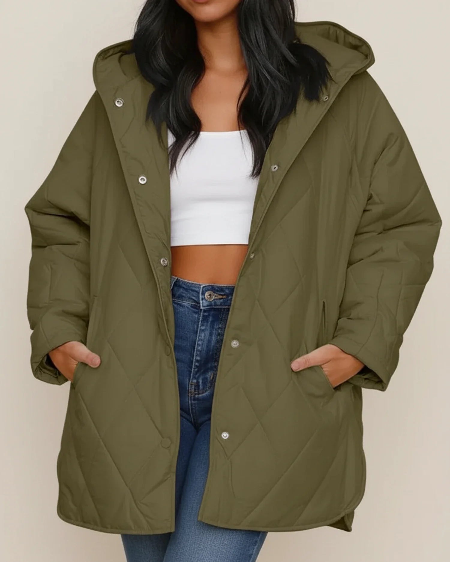 Women's oversized quilted longline hooded winter jacket with patch pockets for everyday warmth