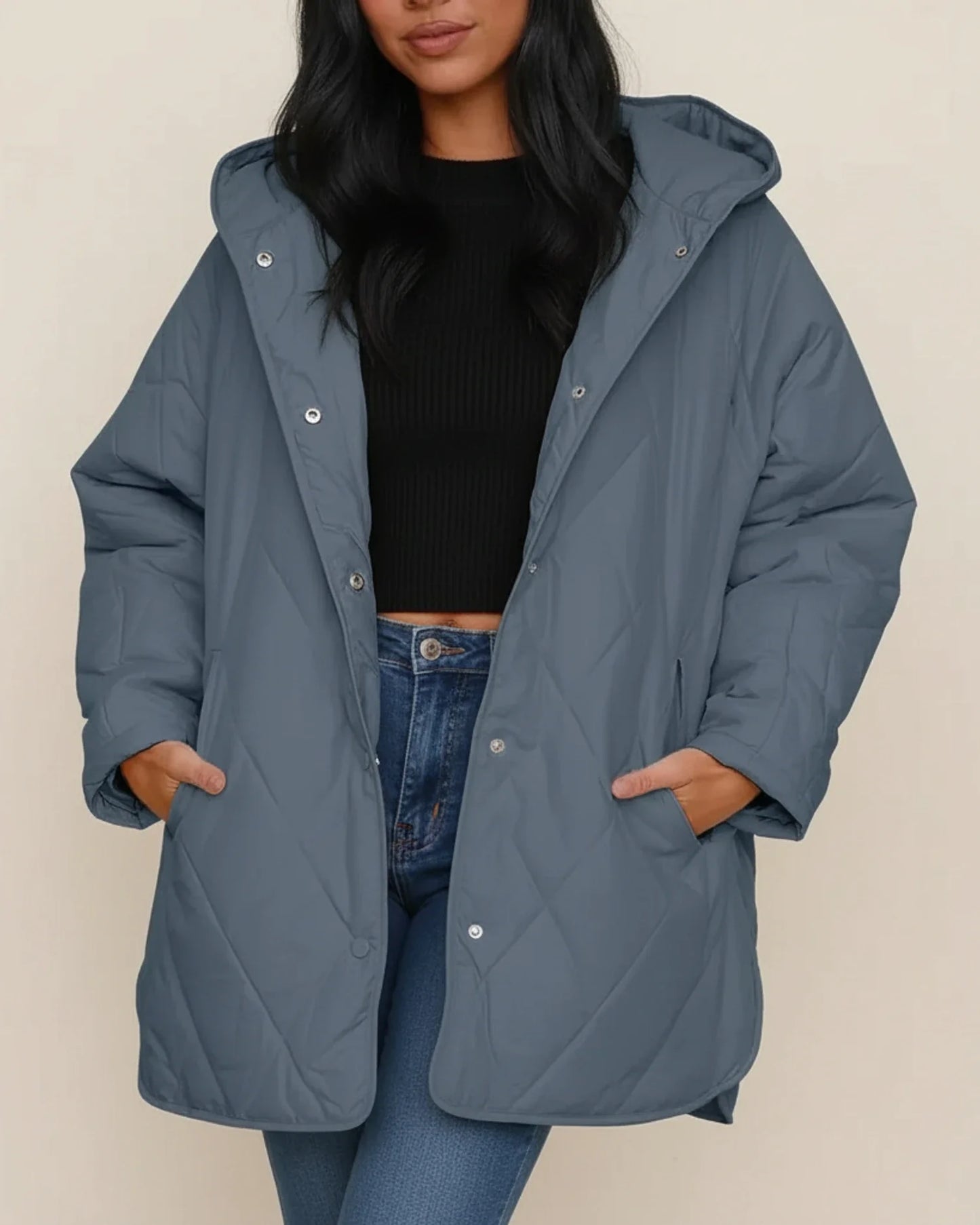 Women's oversized quilted longline hooded winter jacket with patch pockets for everyday warmth