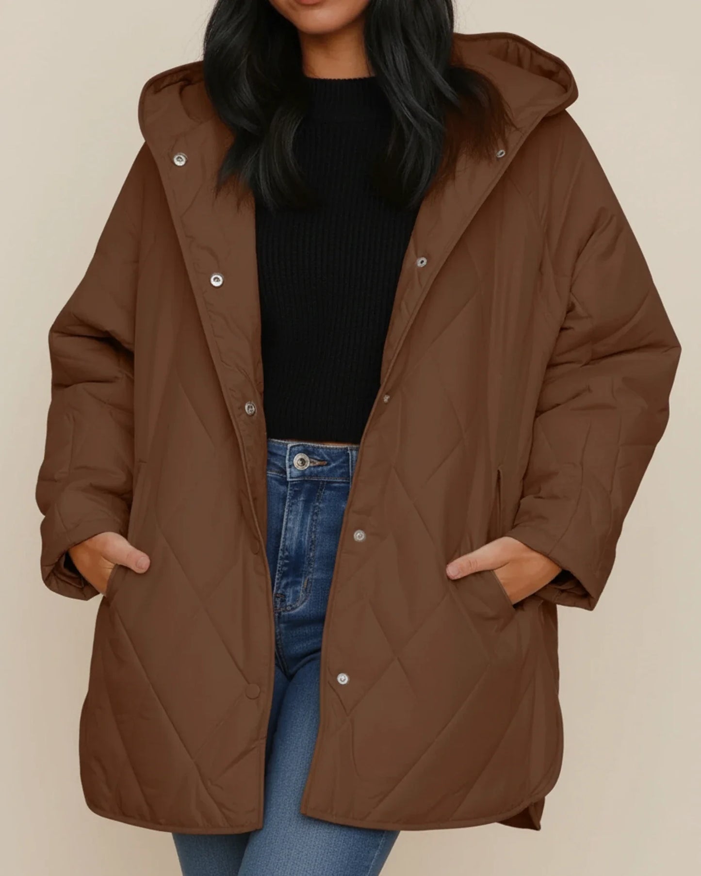 Women's oversized quilted longline hooded winter jacket with patch pockets for everyday warmth