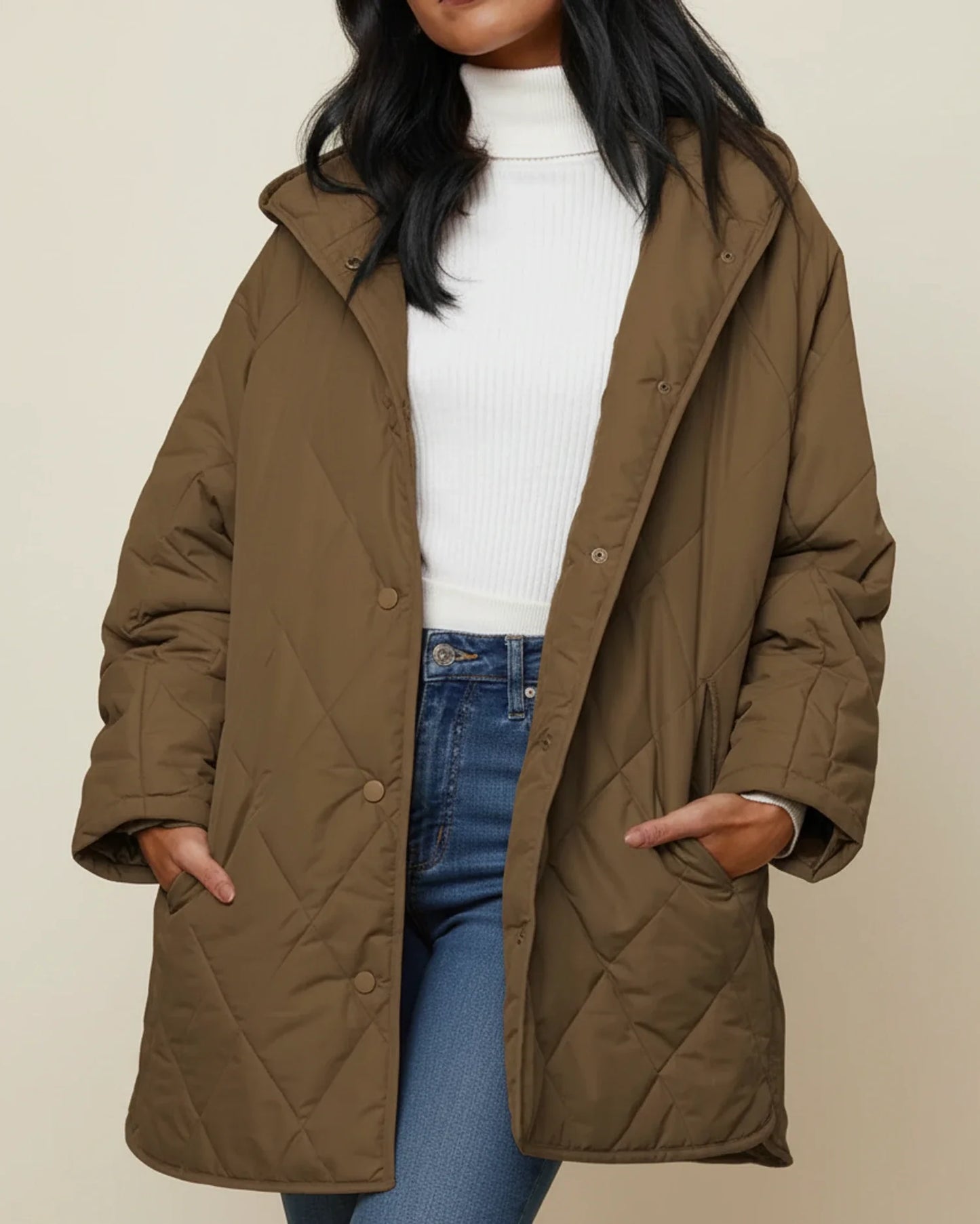 Women's oversized quilted longline hooded winter jacket with patch pockets for everyday warmth