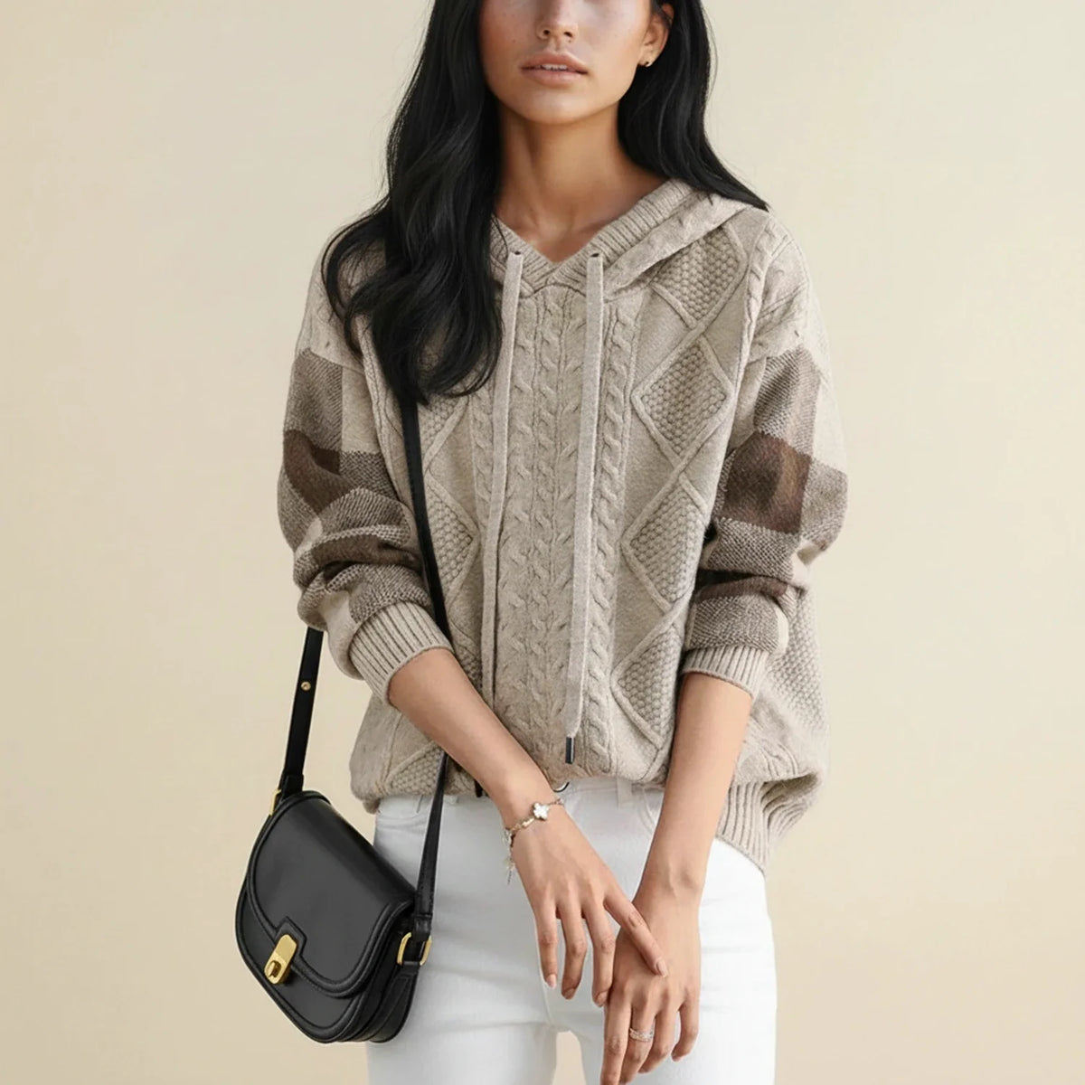 Women's cozy cable knit hoodie sweater with drawstring hood and color block sleeves