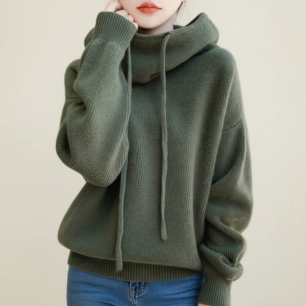 Women's oversized hooded sweater in cozy knit with cowl neck drawstring for warm casual winter style