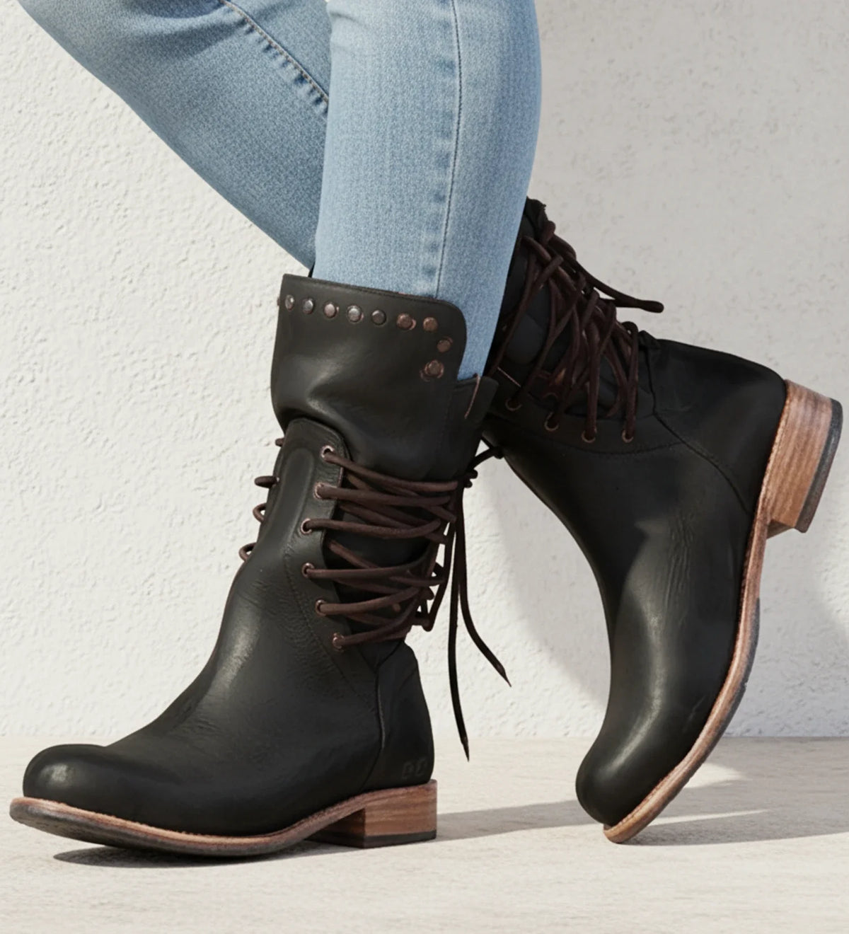 Women's black lace-up ankle boots mid-calf height versatile style for casual and dressy occasions