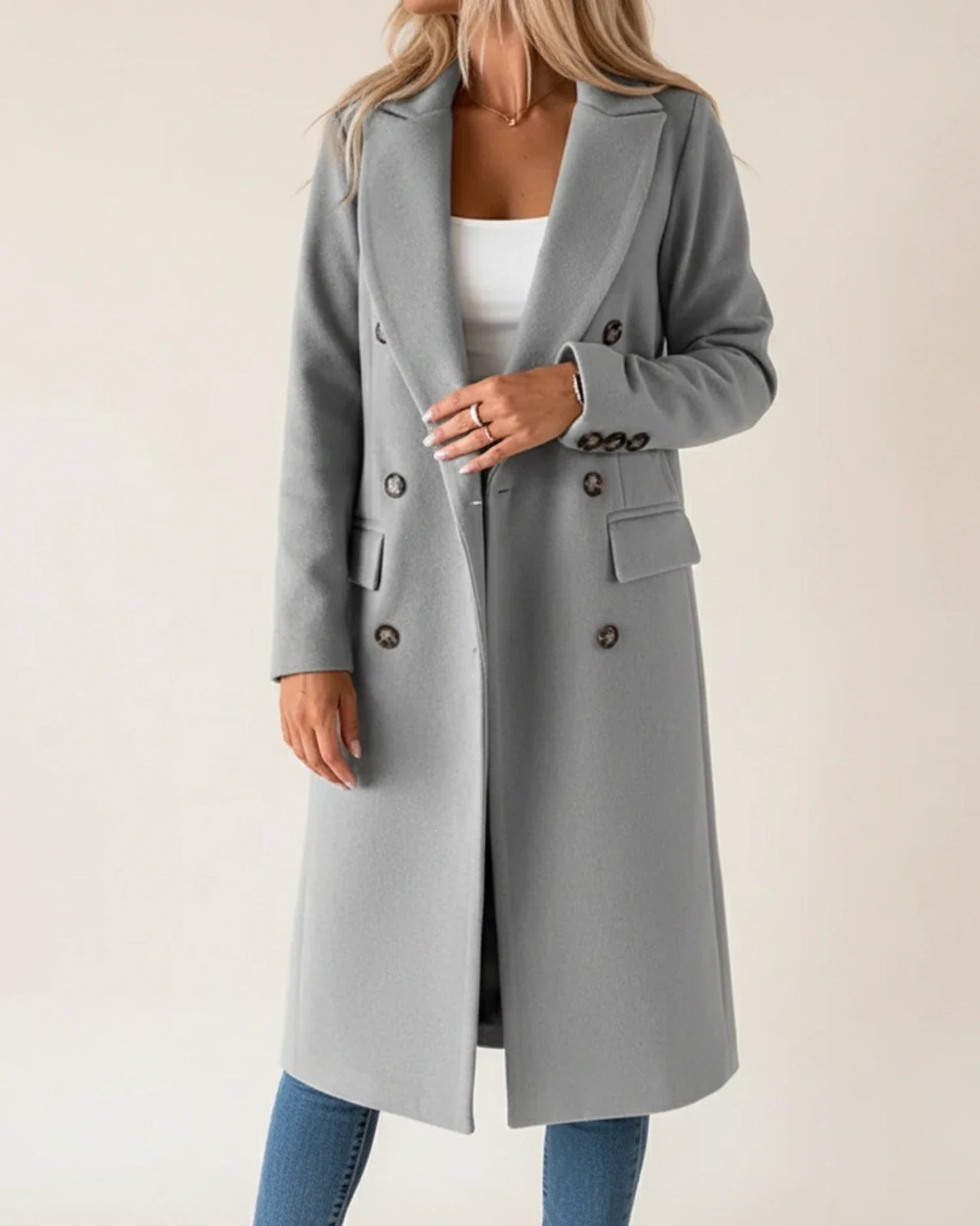 Women's pink double-breasted long trench coat with notch lapels for workwear layering