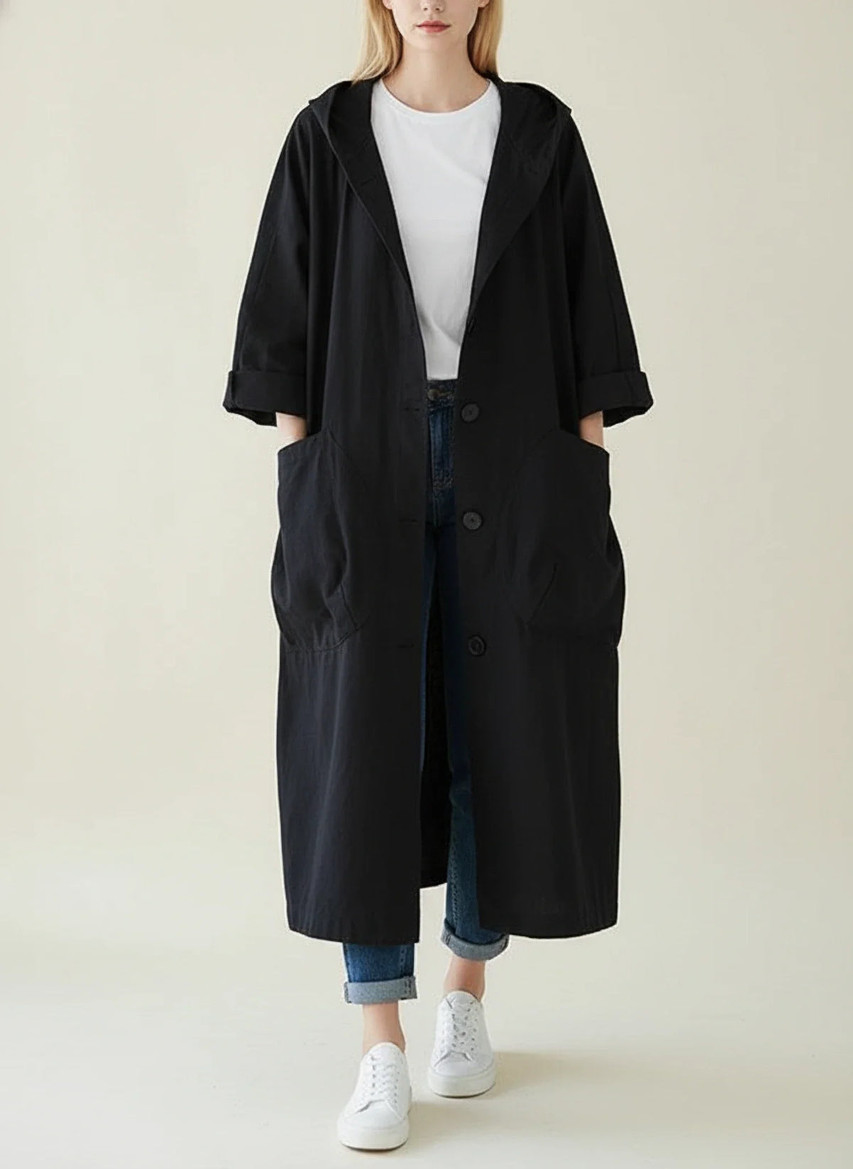 Women's waterproof oversized hooded trench coat with A-line silhouette and large front pockets