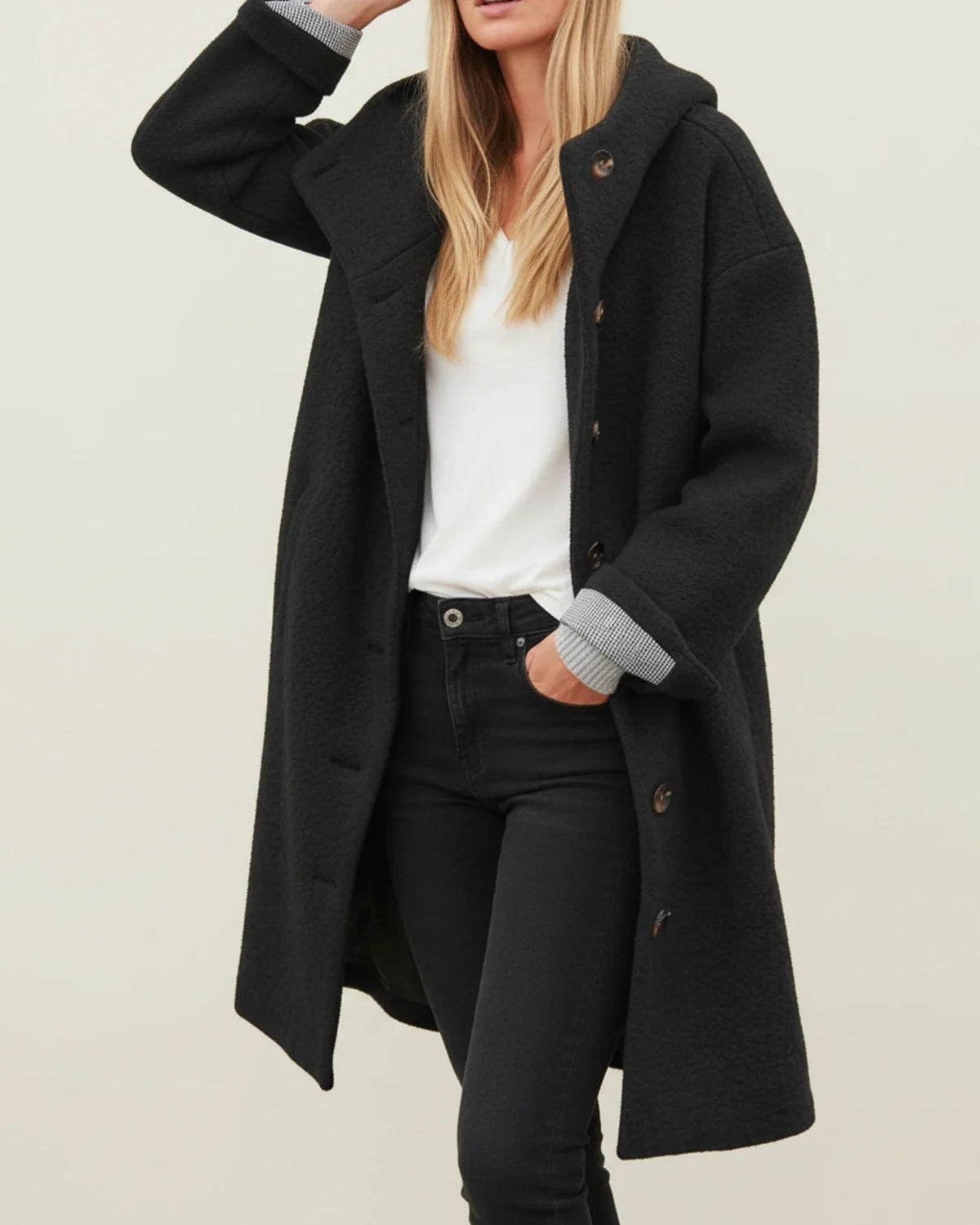 Women's oversized hooded teddy coat long button-front silhouette in cozy plush fabric for winter warmth