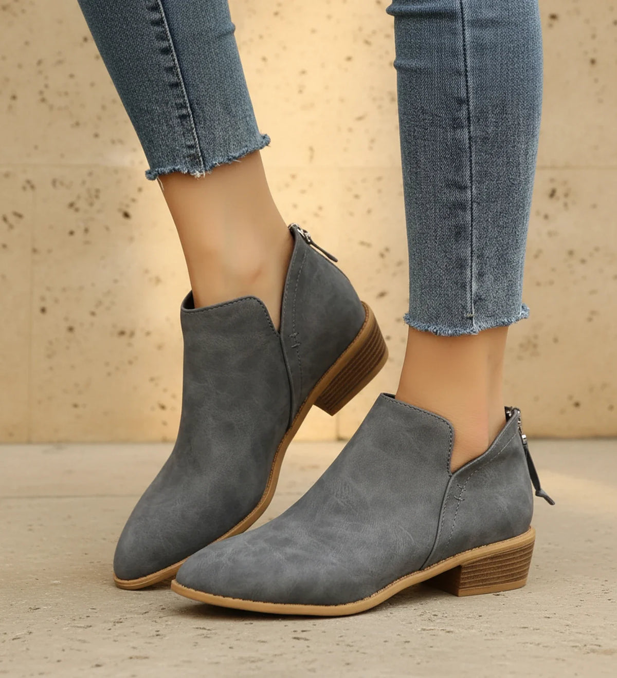 Women's black pointed toe ankle boots with chic V-cutout, sleek silhouette for elevated everyday style