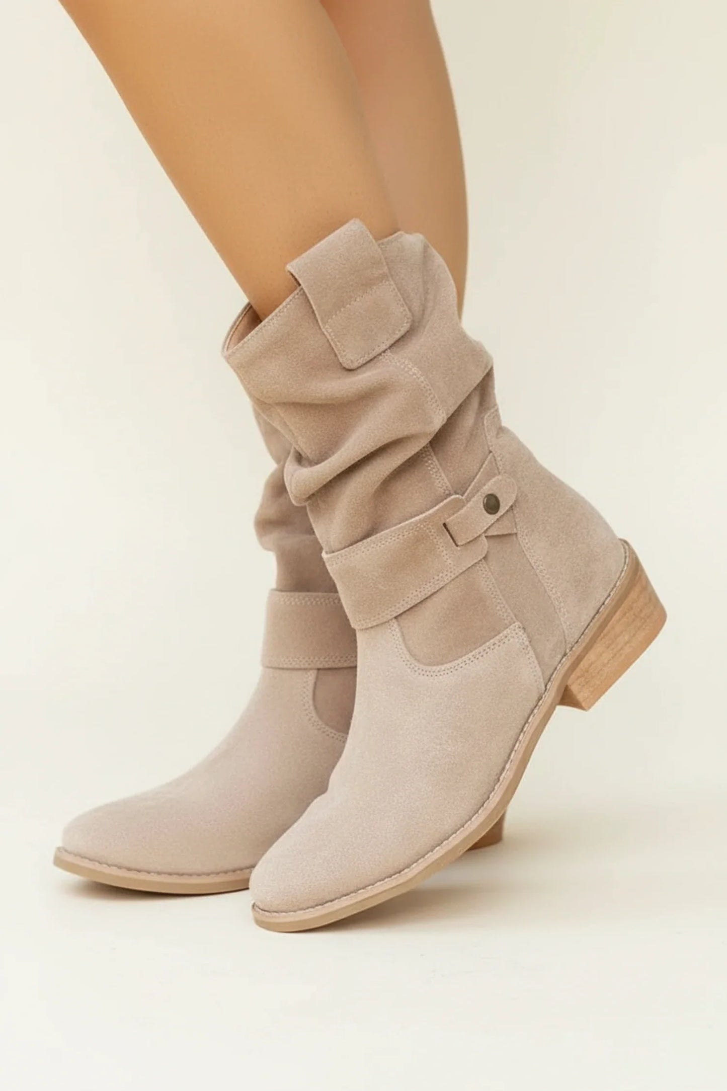 Women's brown slouch ankle boots with gathered shaft and statement buckle detail