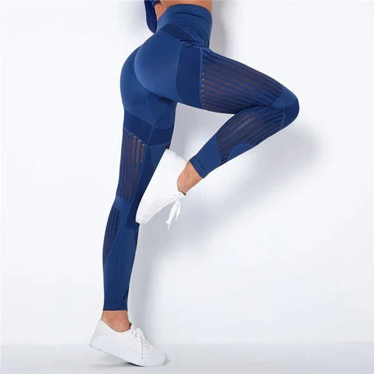Women's black high-rise supportive leggings with anti-cellulite textured surface and body-contouring fit