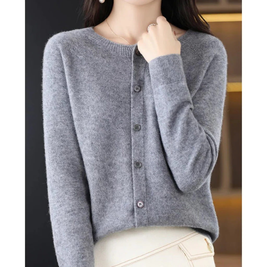 Women's cozy knit cardigan in soft neutral tones with V-neck and front button pullover detail