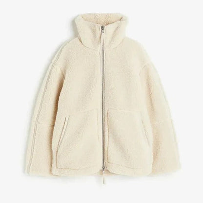 Women's loose fit winter jacket with shaped collar and button-front closure for cozy layered warmth