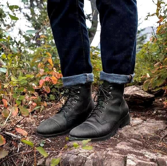 Men's brown leather lace-up ankle boots with weather-resistant insulated construction for winter